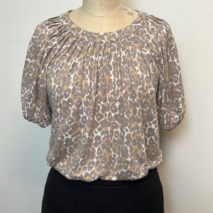 Maeve Scooped and Gathered Leopard Top.  Neutral colors of gray and tan on cream